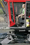 Removal of years of accumulated sediment from irrigation pond using Kaiser spider walking excavator.